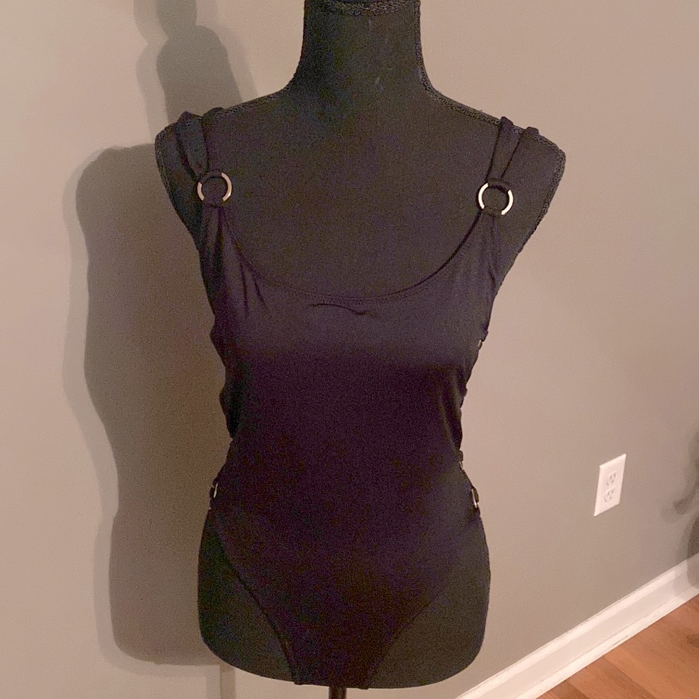 Body suit with cut out sides